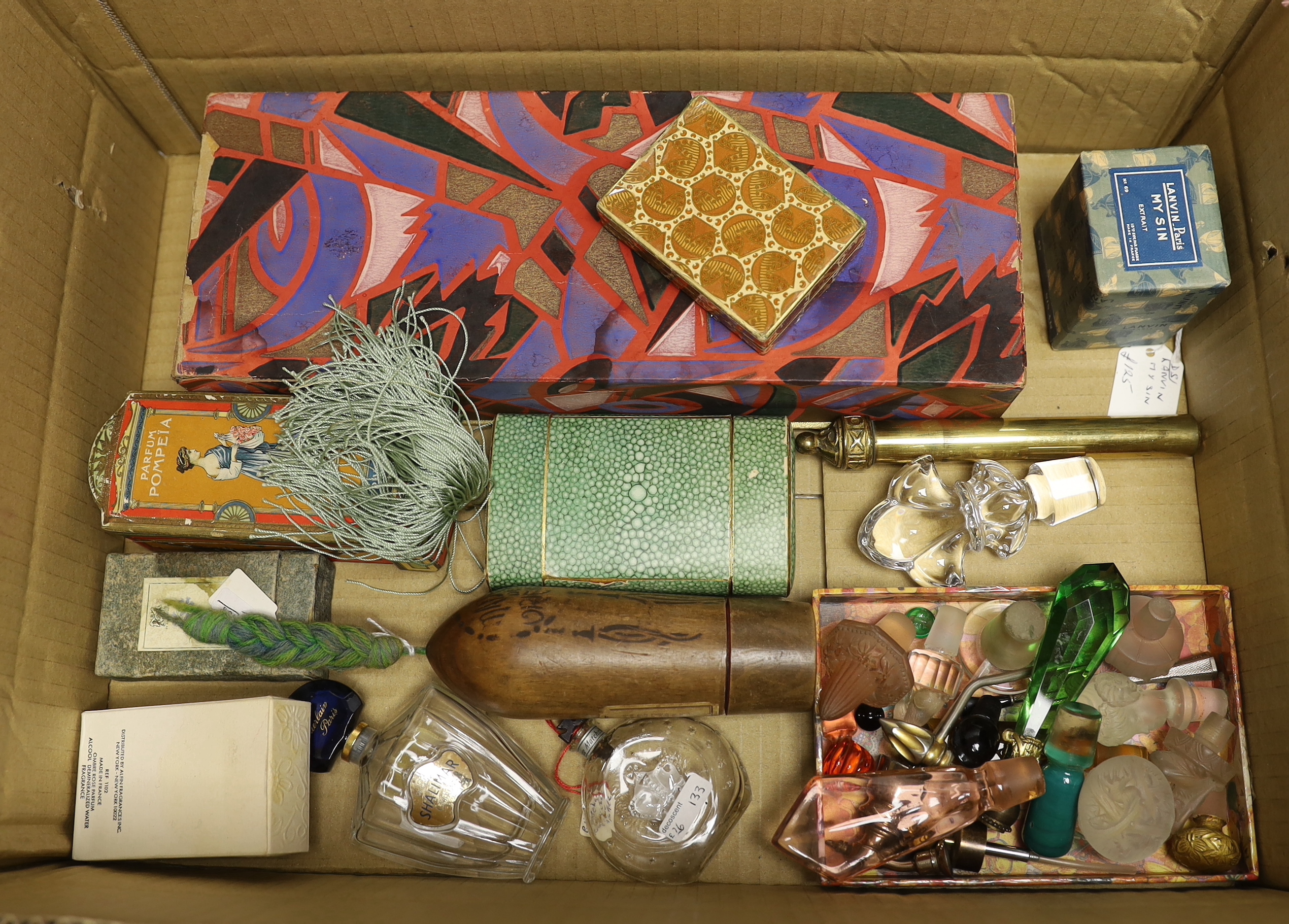 A collection of vintage and later perfume bottles, including Baccarat ‘Nuit de Noel’, Madeira’s de Oriente’ and ‘Corday’, together with unopened Lavin and various stoppers